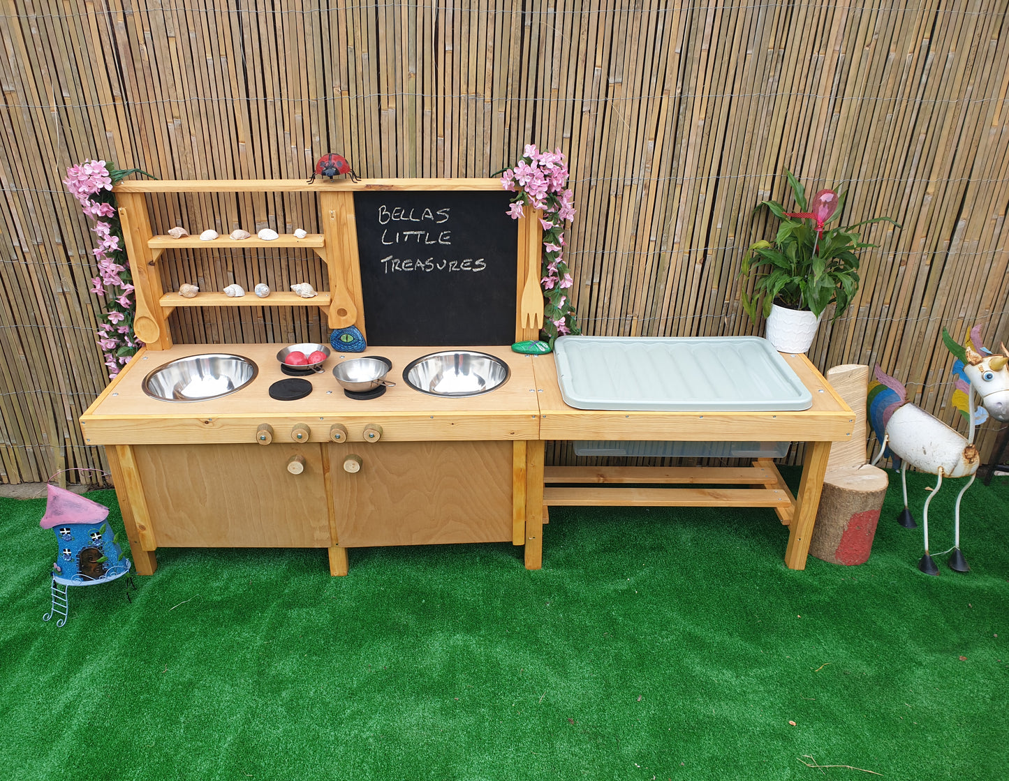 Large mud kitchen with blackboard and water / sand table