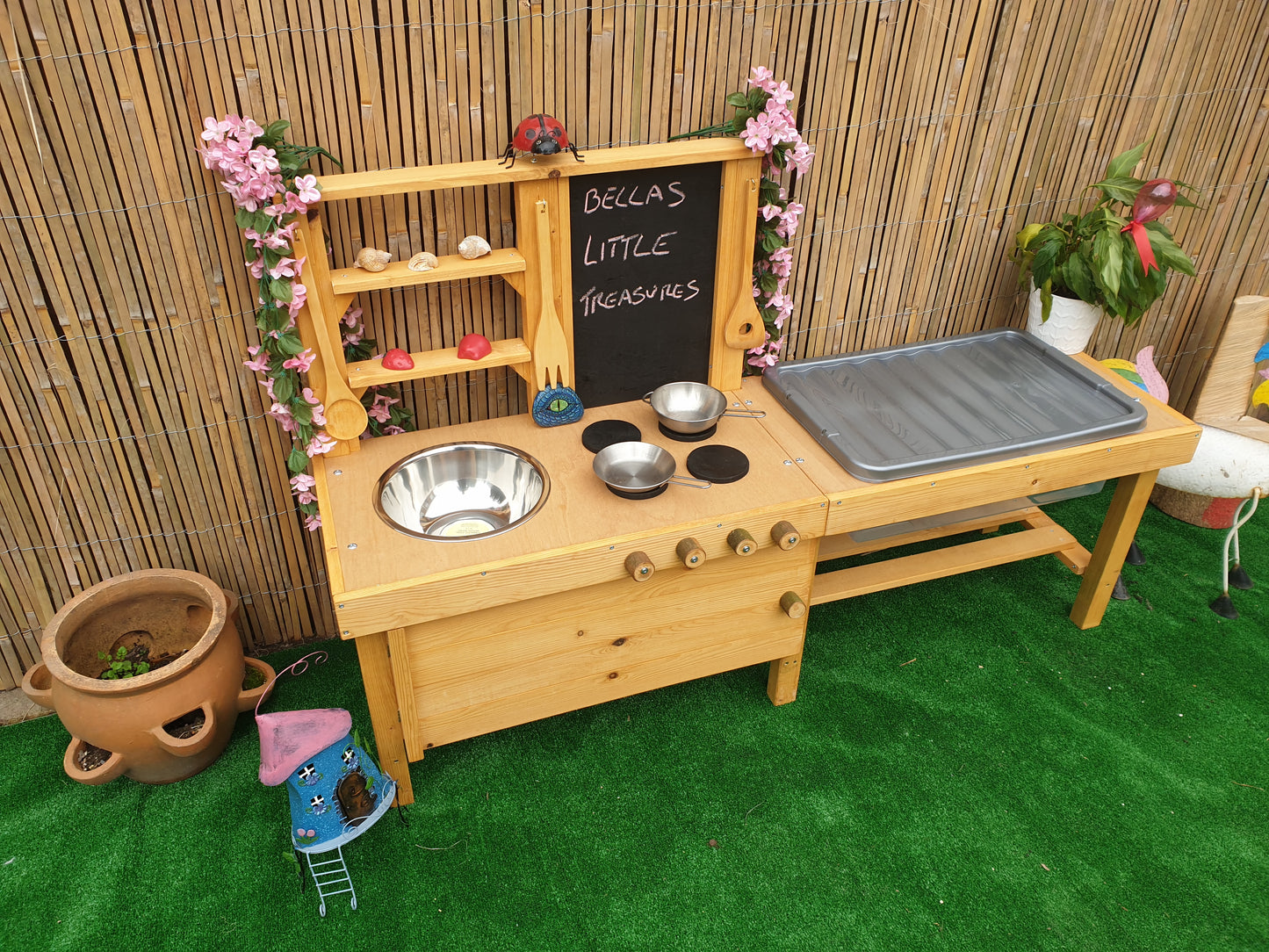 Mud kitchen with blackboard and water/sand table