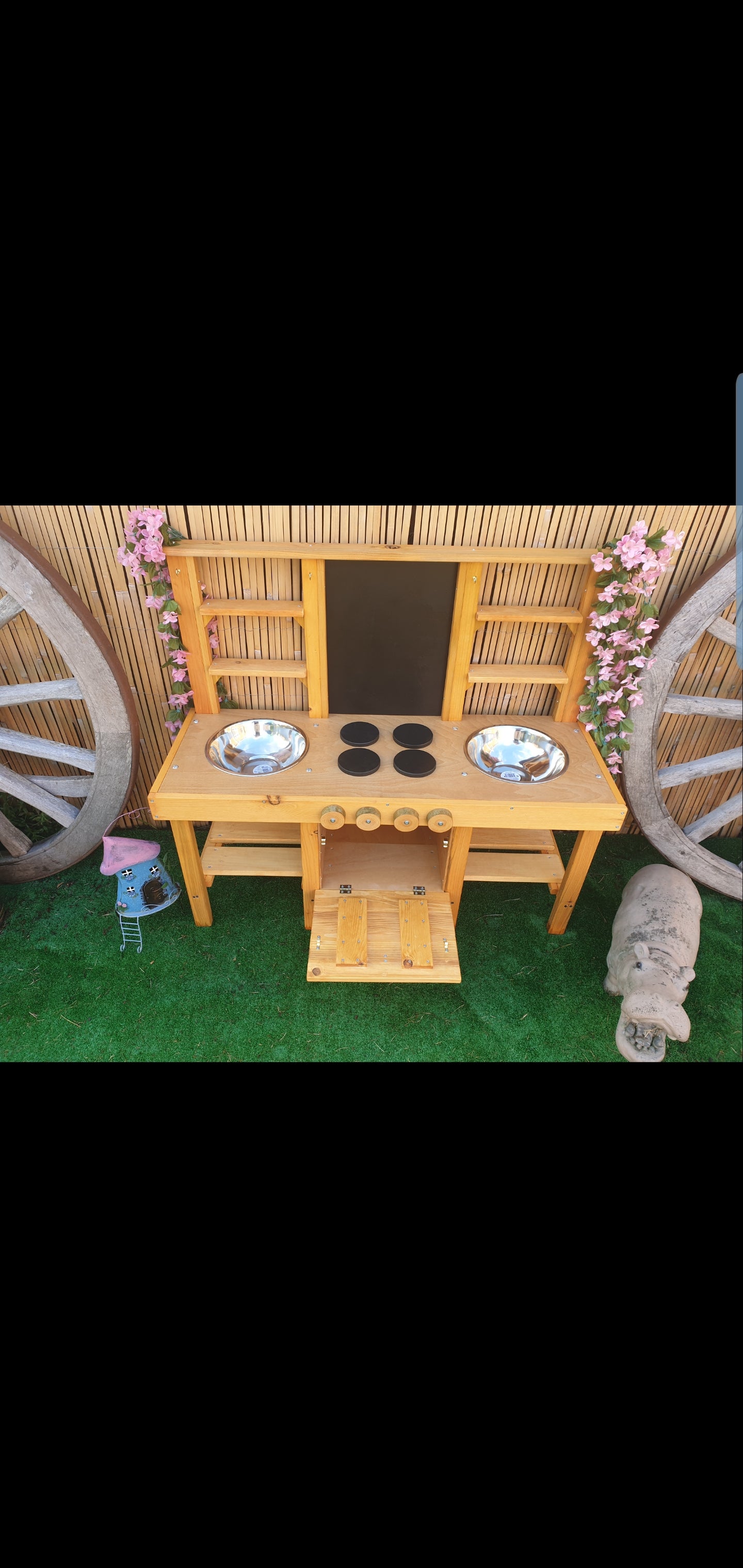 Mud kitchen with drop down oven