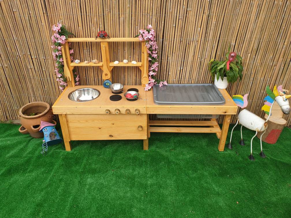 Mud kitchen with blackboard and water/sand table