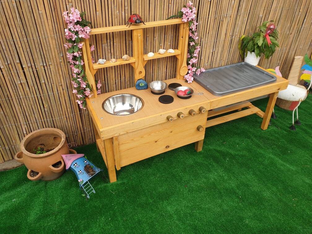 Mud kitchen with blackboard and water/sand table