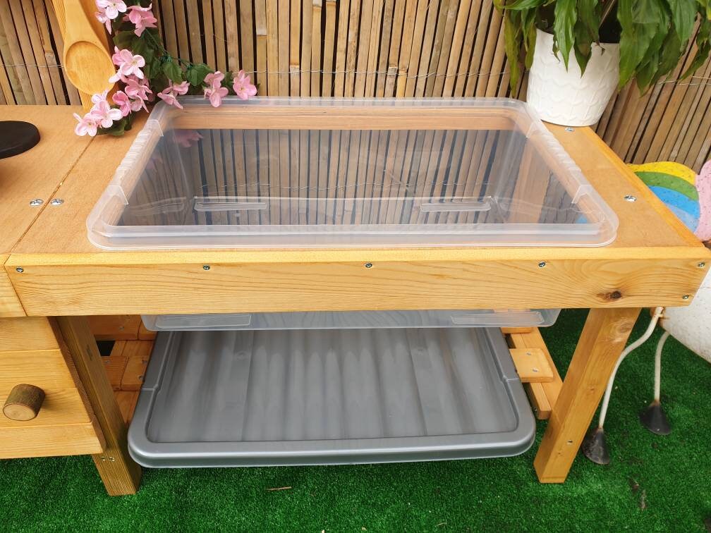 Mud kitchen with blackboard and water/sand table