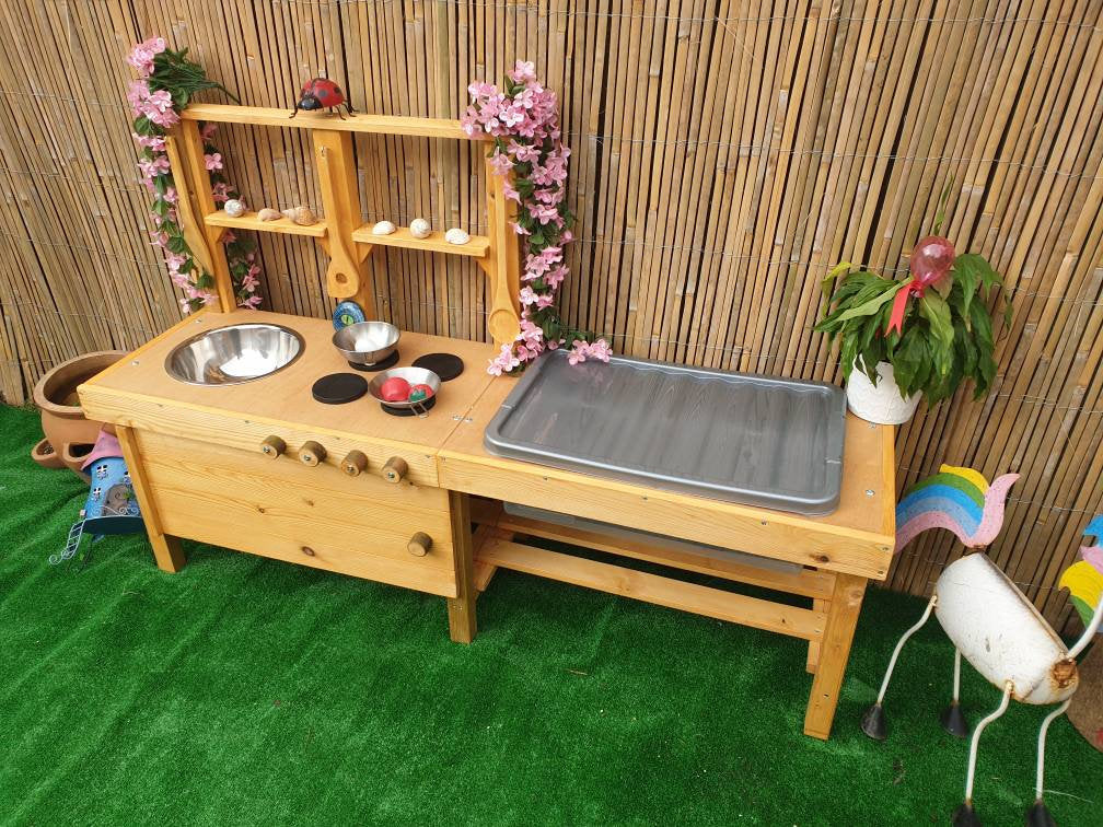 Mud kitchen with blackboard and water/sand table