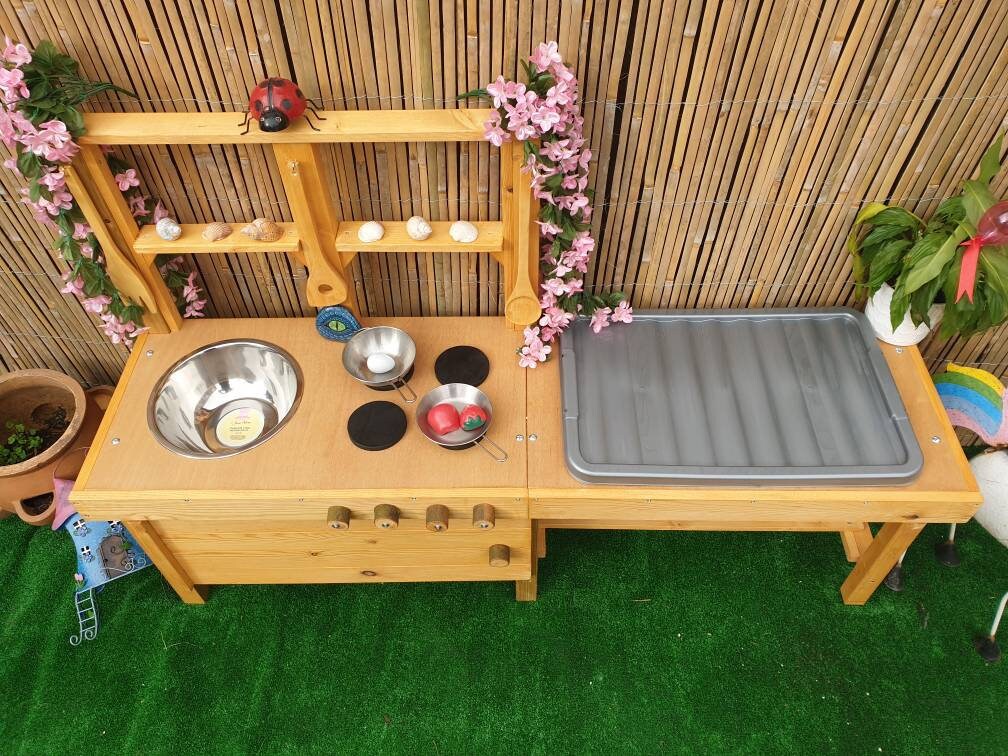 Mud kitchen with blackboard and water/sand table