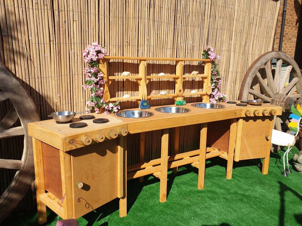 XXL Mud kitchen with 3 bowls, 2 ovens, and 8 utensil hooks.